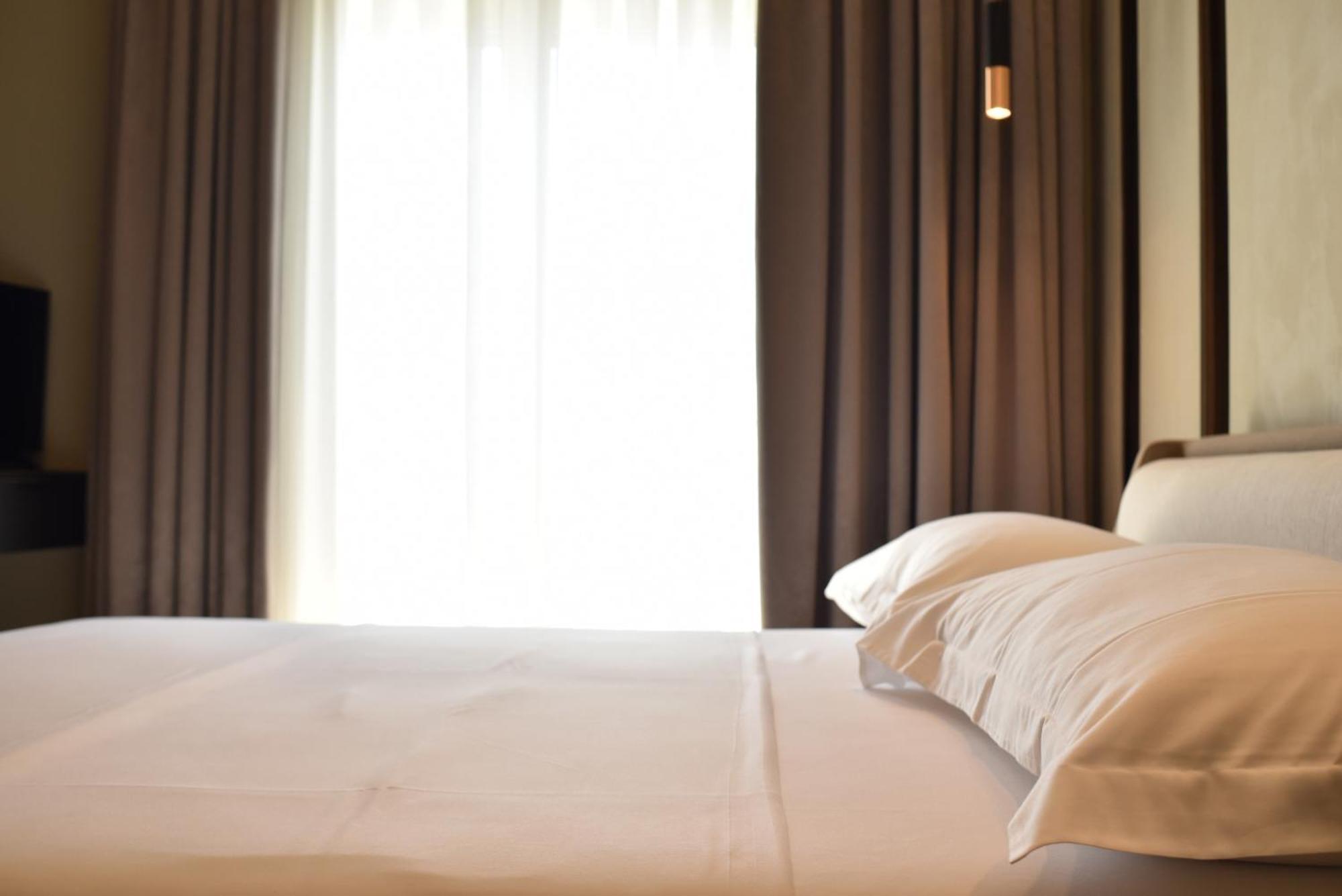 Nuna Hotel Radhima Szoba fotó