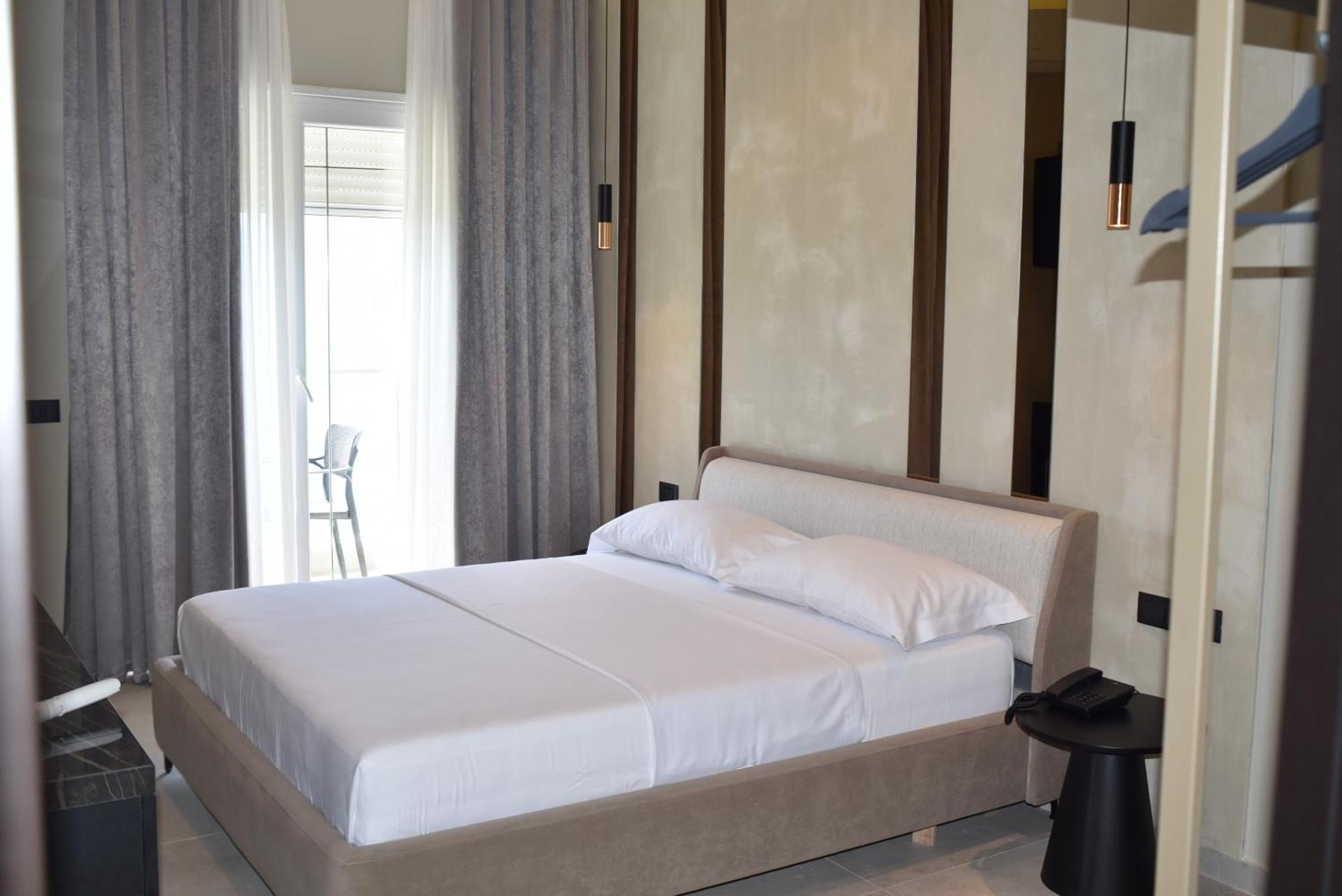 Nuna Hotel Radhima Szoba fotó